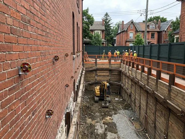 Monitoring targets on a neighbouring wall beside a shored excavation